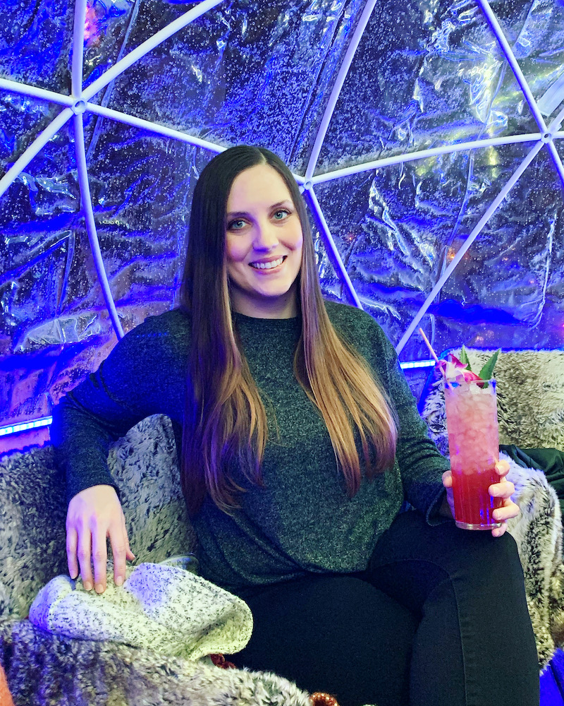 Lynsie at an outdoor dining igloo at VASO in Columbus Ohio.